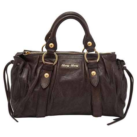 Miu Miu Sacca Vitello Phenix Bag in Brown Leather.